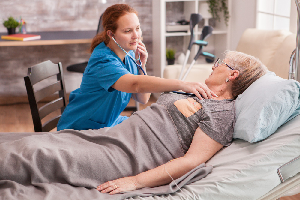 Nurse assisting elderly patient with morning routine